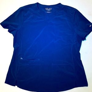 The scrub top has matching bottoms that can be sold together or separately!